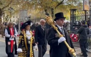 Mace-Bearer Kenneth Bond carries the Mace before the Lord Mayor of the City of Birmingham at the 2022 Remembrance Sunday Parade